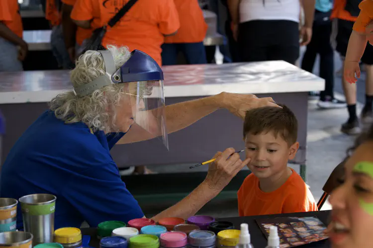 Child having his face painted